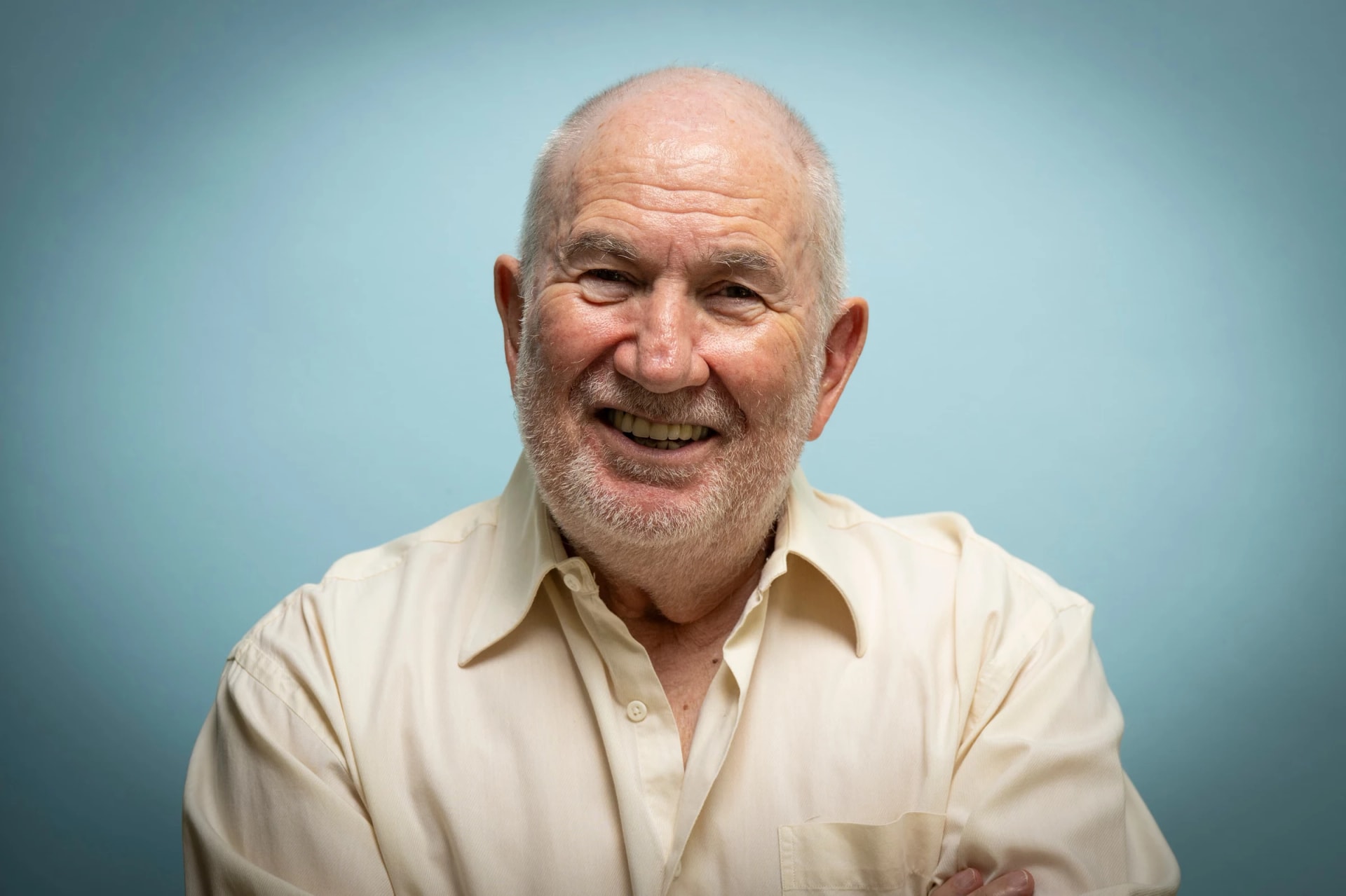 Tony Klinger, laughing